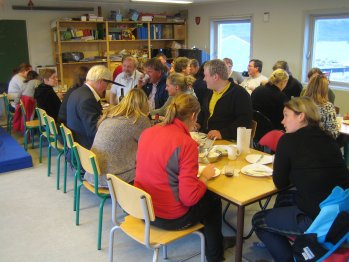 [Having dinner at the village school (another view)]